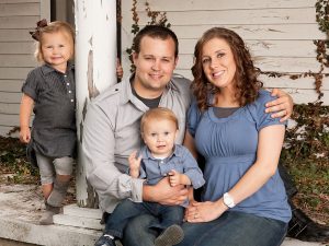Josh Duggar with his wife and two kids. This picture was taken prior to the birth of his third child. Photo Source: Discovery/Scott Enlow