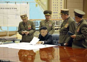 North Korean dictator Kim Jong Un with his general staff. (Source: dailymail.co.uk)