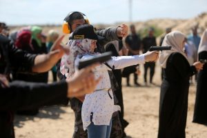 Young Palestinian girls gets firearms training in the Gaza Strip by Hamas soldiers who are preparing them to fight the Israeli's.