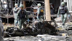 Thailand's bomb squad checks out a car bomb that exploded at a hotel in downtown Pattani, Thailand. A least one person is dead and over 30 are wounded.