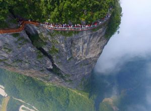 Hundreds of people flocked to a new glass sidewalk built on the side of a mountain in Hunan, China