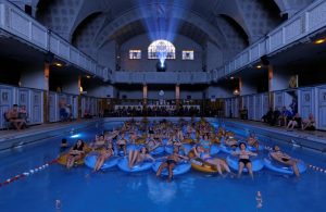 The European Fantastic Film festival continued at Strasbourg, France. These people are enjoying a screening of "Jaws" while relaxing at the Strasbourg public baths.