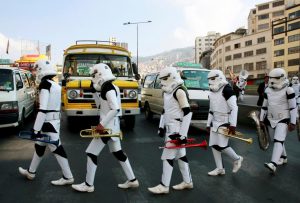 These may be the most unusual high school band uniforms ever! The band is walking in downtown La Paz, Bolivia in preparation for a parade.