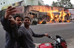 Even in the midst of violence, chaos, and a raging war over water in India, it seems there is always time for a Facebook update.