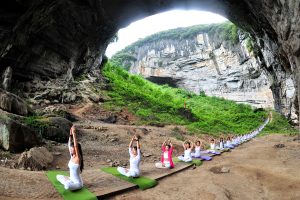deciding they needed a change of pace from their regular yoga studio, this group of yoga practitioners in Hunan, China took their practice to some place they wouldn't normally go.