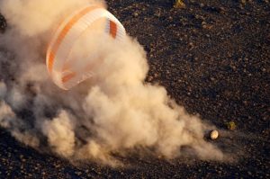 The Russian Soyuz capsule lands in Kazakhstan bringing home the crew of the International Space Station.