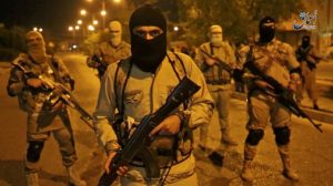 Soldiers of the army of the Islamic State patrol the streets of Mosul, Iraq last week.