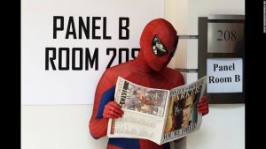 Even a superhero needs to take a break every now and then and catch up on the news.